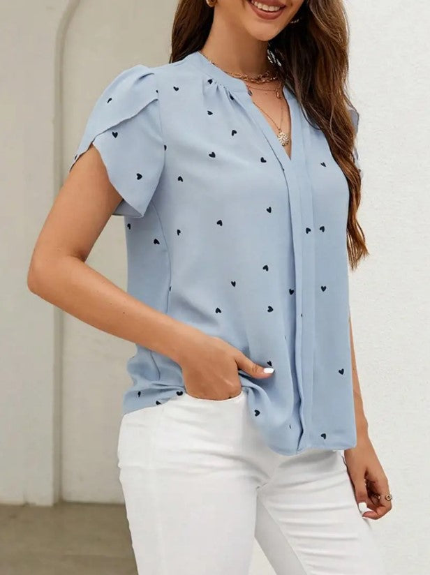 CARILÓ™ BLUSA ESTAMPADA CON VOLANTES